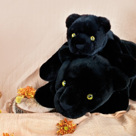 peluche panthere noire allongee