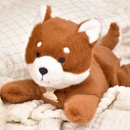 Panda roux peluche allongee - 30 cm